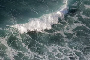 Looking down on breaking wave off the Causeway coast, Antrim county, Northern Ireland Looking down on breaking wave off the Causeway coast, Antrim county, Northern Ireland