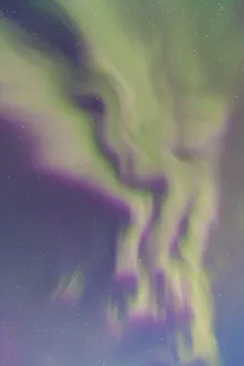 Looking up into the northern lights (Aurora Borealis). Jokulsarlon glacier lagoon Looking up into the northern lights (Aurora Borealis). Jokulsarlon glacier lagoon