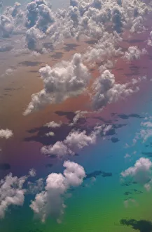 Looking down onf Clouds over Atlantic Ocean with rainbow colours Looking down onf Clouds over Atlantic Ocean with rainbow colours