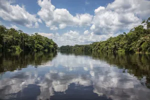 Luilaka River with clouds reflected in the surface of the water Luilaka River with clouds reflected in the surface of the water