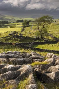Malham Moor, with stormy skies over Winskill and Ribblesdale with Pen-y-Ghent shrouded in cloud Malham Moor, with stormy skies over Winskill and Ribblesdale with Pen-y-Ghent shrouded in cloud