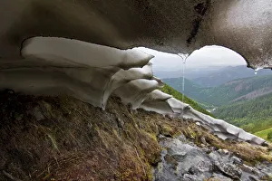 Melting snow in mountain gully, Western Tatras, Carpathian Mountains, Slovakia, June 2009 Melting snow in mountain gully, Western Tatras, Carpathian Mountains, Slovakia, June 2009