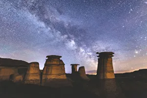 Milky-way over hoodoo rock formations in the Canadian badlands, Drumheller, Alberta Milky-way over hoodoo rock formations in the Canadian badlands, Drumheller, Alberta