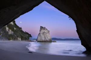 Moon over Cathedral Cove at dawn, near Hahei, Coromandel Peninsula, North Island Moon over Cathedral Cove at dawn, near Hahei, Coromandel Peninsula, North Island