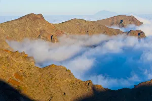 Mountains with low clouds surrounding them, La Caldera de Taburiente National Park Mountains with low clouds surrounding them, La Caldera de Taburiente National Park