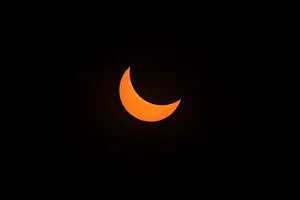 American Natural Wonders Prints: Partial eclipse of the sun prior to total eclipse