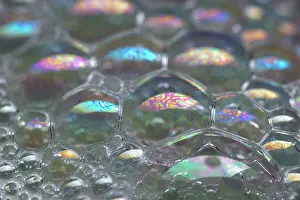 Patterns on soap bubble showing light interference patterns