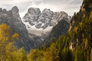The Three Peaks and Monte Cristallo with autumn trees. Dolomites, Italy, October 2019 The Three Peaks and Monte Cristallo with autumn trees. Dolomites, Italy, October 2019