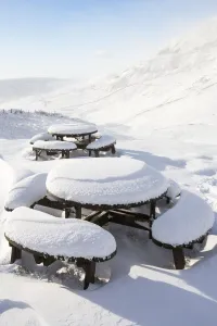 Picnic tables on the summit of Kirkstone Pass, plastered in fresh snow after overnight Picnic tables on the summit of Kirkstone Pass, plastered in fresh snow after overnight