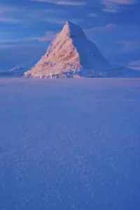 Pyramid of sea ice catching the first rays of the returning sun in the high Arctic Pyramid of sea ice catching the first rays of the returning sun in the high Arctic