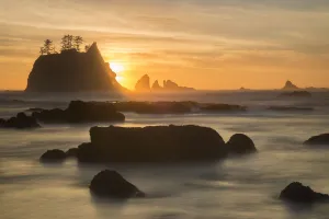 Rock formations silhouetted at sunset on the Pacfic coast of Olympic National Park Rock formations silhouetted at sunset on the Pacfic coast of Olympic National Park