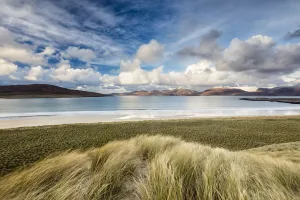 Sand dunes at Luskentyre with view to Taransay. Isle of Harris, Outer Hebrides, Scotland, UK Sand dunes at Luskentyre with view to Taransay. Isle of Harris, Outer Hebrides, Scotland, UK