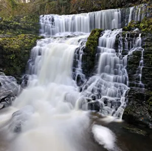 Sgwd Isaf Clun-gwyn waterfall. Ystradfellte, Brecon Beacons National Park, Wales Sgwd Isaf Clun-gwyn waterfall. Ystradfellte, Brecon Beacons National Park, Wales