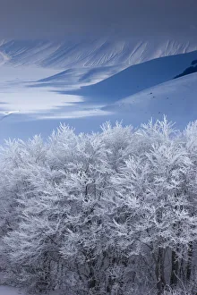 Snow-covered Piano Grande in winter. Monti Sibillini National Park, Umbria, Italy Snow-covered Piano Grande in winter. Monti Sibillini National Park, Umbria, Italy