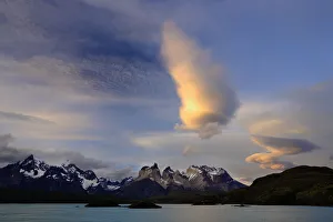 Sunset clouds over Paine mountains, seen from Pehoe Lake, Torres del Paine National Park Sunset clouds over Paine mountains, seen from Pehoe Lake, Torres del Paine National Park