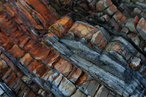 Cornwall Coastal Landscape Prints: Tilted sandstone, mudstone and siltstone rock strata contorted by tectonic plate movement during Hercynian orogeny