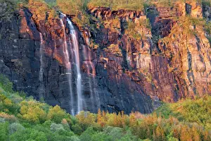 Nordland Norway Landscapes Prints: Waterfall cascading over cliffs during midnight sun, Nordland, Norway. June, 2022