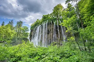 Waterfall In Southern Europe Prints: Waterfall surrounded by forest, Plitvice Lakes National Park, Croatia. August, 2023