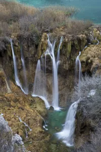 Waterfalls cascading between mountain lakes, Plitvice Lakes National Park, Croatia Waterfalls cascading between mountain lakes, Plitvice Lakes National Park, Croatia