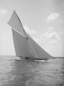The 12 Metre yacht Alachie makes swift progress upwind, 1911. Creator: Kirk & Sons of Cowes The 12 Metre yacht Alachie makes swift progress upwind, 1911. Creator: Kirk & Sons of Cowes