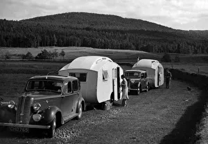 1937 Hillman 14 towing caravan. Creator: Unknown 1937 Hillman 14 towing caravan. Creator: Unknown