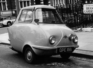 Transportation In The 20th Century Prints: 1964 Scootacar Microcar. Creator: Unknown
