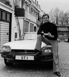 1977 Jaguar XJS with Ian Ogilvy as The Saint tv character. Creator: Unknown 1977 Jaguar XJS with Ian Ogilvy as The Saint tv character. Creator: Unknown