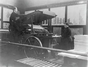 Vintage Printing Equipment Prints: 2 men operating map printing press at U