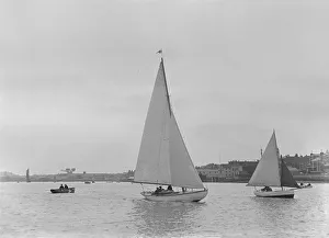 Bermuda Rigged Sailboat Prints: A 5 ton sloop, possibly Armonelle, under sail, 1921. Creator: Kirk & Sons of Cowes