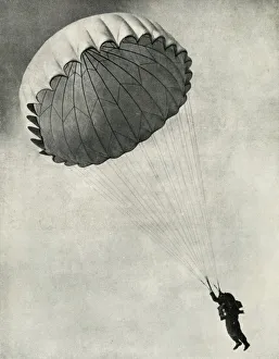 Royal Air Force Images Prints: Airman using a parachute during the Second World War, 1941. Creator: Charles Brown
