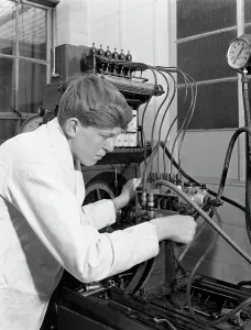 Apprentice at work, Globe & Simpson auto electrical workshop Print