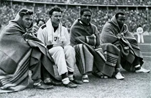Athletes Frank Wykoff, Paul Hanni, Ralph Metcalfe and Jesse Owens, Berlin Olympics, 1936 Athletes Frank Wykoff, Paul Hanni, Ralph Metcalfe and Jesse Owens, Berlin Olympics, 1936