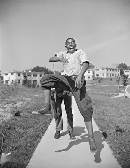 Boys playing leap frog near the project, Frederick Douglass housing project, Anacostia, D.C. 1942 Boys playing leap frog near the project, Frederick Douglass housing project, Anacostia, D.C. 1942