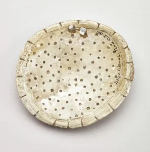 Native American Headdress Prints: Circular shell gorget with scalloped edges, 1200-1500. Creator: Unknown