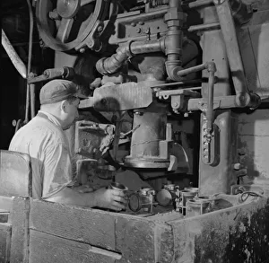 Second World War Manufacturing Prints: A core blowing machine, New Britain, Connecticut, 1943. Creator: Gordon Parks