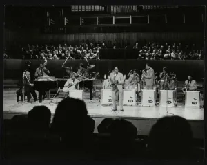 Prints of The Count Basie Orchestra performing at the Royal Festival Hall, London, 18 July 1980 Event Prints: The Count Basie Orchestra at Royal Festival Hall, London Print 1980