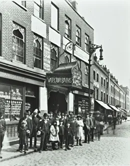 Crowd outside Russian Vapour Baths, London Print 1904