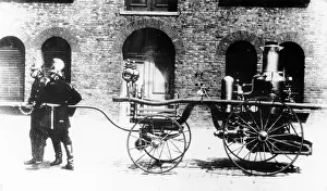 Black And White Colonial Images Prints: Early Fire Engine, c1890s. Creator: Unknown