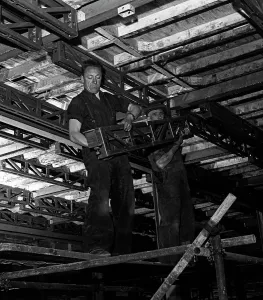 Construction Worker Job Prints: Engineers lifting steelwork into position, South Yorkshire, 1954. Artist: Michael Walters