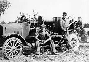 Vintage Farm Equipment Images Prints: Farmworkers with a tractor, (c1930s?)