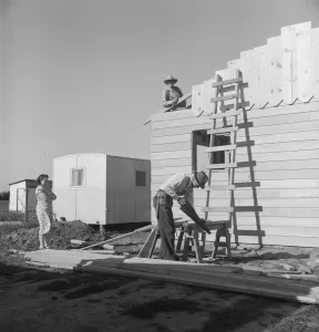Father and son building house on outskirts of Salinas, California, 1939. Creator: Dorothea Lange Father and son building house on outskirts of Salinas, California, 1939. Creator: Dorothea Lange