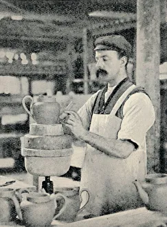 Industrial Manufacturing Process Prints: Fixing Spout on a Teapot, c1917