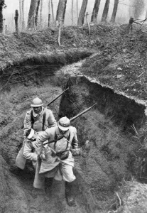 French soldiers carrying a wounded companion from the front, First World War, 1917 French soldiers carrying a wounded companion from the front, First World War, 1917