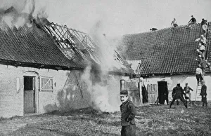 French soldiers fight a fire started by German incendiary bombs, Artois, World War I, 1915 French soldiers fight a fire started by German incendiary bombs, Artois, World War I, 1915