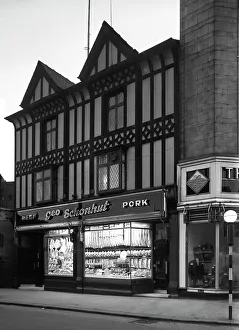Prints of George Schonhuts butchers shop, Rotherham, South Yorkshire, 1955. George Schonhuts butchers shop in All Saints Square in Rotherham, with its elegant Columbaged facade South Yorkshire Prints: George Schonhuts Butchers Shop Print, Rotherham 1955
