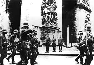 WWII Black And White Photographs Prints: German troops marching past the Arc de Triomphe, Paris, 14 June 1940