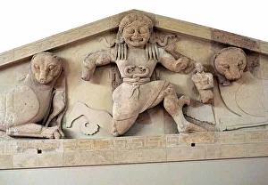 A gorgon and panthers from the pediment of the temple of Artemis on Corfu. Artist: Unknown A gorgon and panthers from the pediment of the temple of Artemis on Corfu. Artist: Unknown