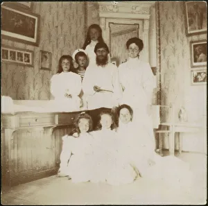 Grigory Rasputin with Empress Alexandra Fyodorovna, her five children and seated right governess Mar Grigory Rasputin with Empress Alexandra Fyodorovna, her five children and seated right governess Mar