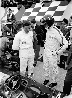 Jim Clark and Graham Hill in pits with Lotus 49 during 1967 British Grand Prix Jim Clark and Graham Hill in pits with Lotus 49 during 1967 British Grand Prix