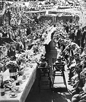 Jubilee tea party for children in Orville Road, Battersea, London, 1935 Jubilee tea party for children in Orville Road, Battersea, London, 1935
